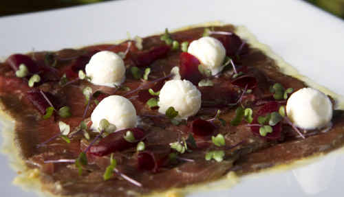 Bamboo serves meals such as cured lamb, with goats cheese sorbet. Bamboo serves meals such as cured lamb, with goats cheese sorbet.